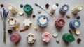 A variety of decorative candles are arranged on a light surface. These include pillar candles, some Royalty Free Stock Photo