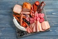 Variety of delicious deli meats on slate plate Royalty Free Stock Photo