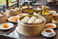 A variety of delicious dim sum in bamboo steamers, showcasing culinary diversity Royalty Free Stock Photo