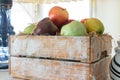 A variety of different fruits in a wooden box close up Royalty Free Stock Photo