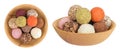 A variety of different truffles in a wooden bowl Isolated on a white background. Top view. Flat lay Royalty Free Stock Photo