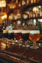 Assorted Beer Glasses Lined on Bar Counter Royalty Free Stock Photo