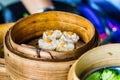 Variety of dim sum in bamboo steam containers