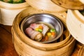 Variety of dim sum in bamboo steam containers