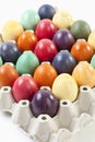 Variety of Easter eggs in egg carton, elevated view Royalty Free Stock Photo