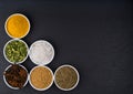 A variety of exotic spices in ceramic bowls top view Royalty Free Stock Photo