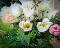 A variety of fake flowers are used to decorate the wedding reception room. lily, rose, tulip etc Royalty Free Stock Photo