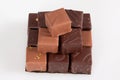 variety fine artisanal chocolate pralines in pyramid view in white background