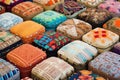 a variety of finished footstools displayed in patterns Royalty Free Stock Photo