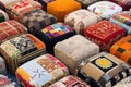 a variety of finished footstools displayed in patterns Royalty Free Stock Photo