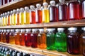 variety of flavored cough syrup bottles in the storage area