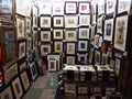 A variety of framed artwork for sale