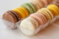 A Variety Of French Macarons On A White Table