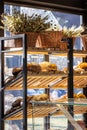 Variety of fresh baked artisan bread on a shelf in bakery shop. Gourmet breads for sale Royalty Free Stock Photo