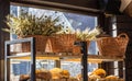 Variety of fresh baked artisan bread on a shelf in bakery shop. Gourmet breads for sale Royalty Free Stock Photo