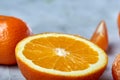 Variety of fresh citrus fruits for making juice or smoothie over light textured background, top view, selective focus. Royalty Free Stock Photo