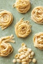 Variety of fresh raw uncooked homemade pasta.