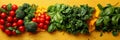 Variety of fresh vegetables and herbs on vivid yellow wooden background. Flat lay composition for vegetarian cuisine and Royalty Free Stock Photo