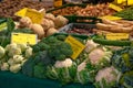 Fresh ecological vegetables for sale at farmer\'s market, cauliflowers, cabbages, onions, food stall