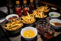 variety of fries and sauces, including sweet potato and truffle oil Royalty Free Stock Photo