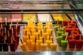 Variety of frozen fruit ice pops and ice cream Royalty Free Stock Photo