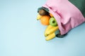 Variety of fruits grapefruit, kiwi, banana, orange from pink li Royalty Free Stock Photo