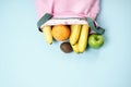 Variety of fruits grapefruit, kiwi, banana, orange from pink li Royalty Free Stock Photo