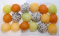 A variety of fruits scooped into bite-sized spheres.