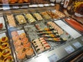 Variety of the gourmet dishes in delicatessen shop in Annecy, France