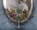 Variety of green and herbal teas in spoon on vintage metal tray