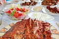 Variety grilled meat and salads