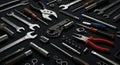 A variety of hand tools are arranged on a dark surface. The collection includes Royalty Free Stock Photo