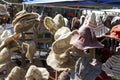 Variety of hats put on sale in open air market
