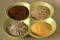 Variety of healthy grains and seeds in bowl: buckwheat, oatmeal, rice, corn Royalty Free Stock Photo