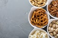 Variety of healthy snacks in white bowls