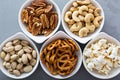 Variety of healthy snacks in white bowls Royalty Free Stock Photo