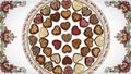 Variety of Heart-Shaped Chocolates on Decorative Plate Royalty Free Stock Photo