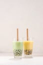 Variety of homemade bubble tea/ boba tea with tapioca pearls on white background