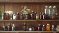 Variety of homeopathic remedies in glass vials and bottles arranged in orderly fashion on a wooden shelf. Concept of Royalty Free Stock Photo