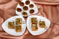 Variety of Indian sweets serves in plates