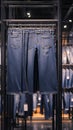 Variety of jeans on display in shopping mall store