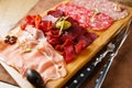 Variety of meats, sausages, salami, ham, olives Royalty Free Stock Photo