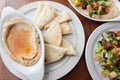 Variety of Mediteranean style dishes like hummus and salad Royalty Free Stock Photo