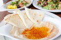 Variety of Mediteranean style dishes like hummus and salad Royalty Free Stock Photo