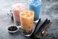 Variety of milk bubble tea in tall glasses