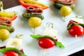 Variety of mini skewer appetizers.