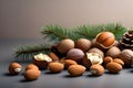 Variety of mixed shelled and shelled nuts on a light background with a green hazel twig. Playground AI platform Royalty Free Stock Photo