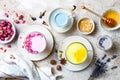 Variety of Moon Milk for a better sleep. Turmeric golden milk, pink rose milk, blue butterfly pea and lavender moon milk.
