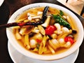 Variety mushrooms in spicy lemon grass soup.
