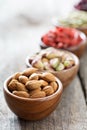 Variety of nuts and dried fruits in small bowls Royalty Free Stock Photo